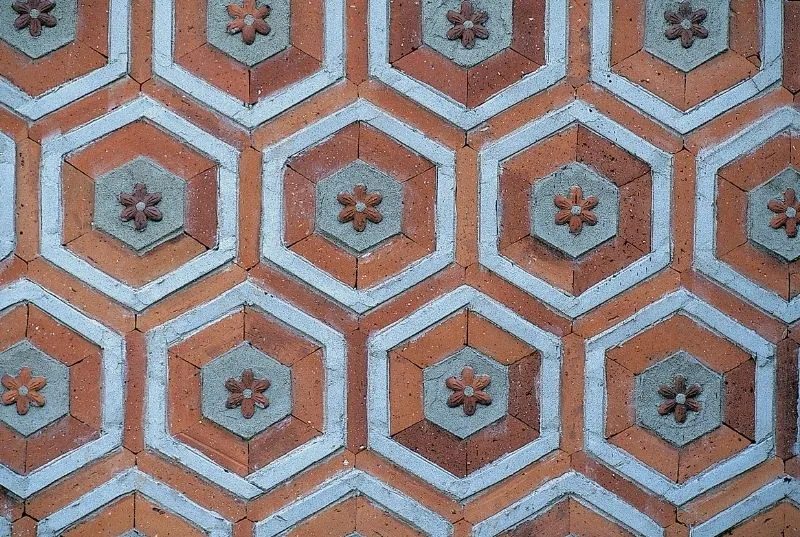 Canberra orange white and green tiles with a flower in the middle
