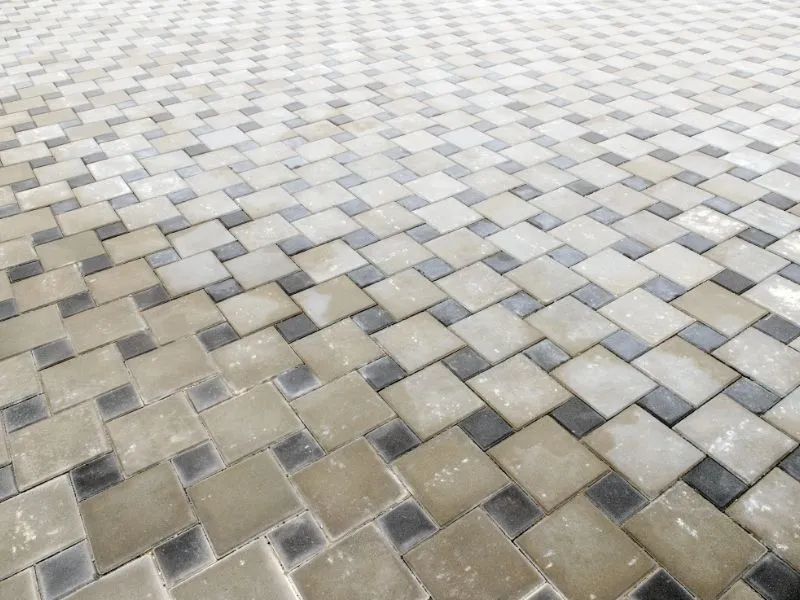 Tiling Outdoor floor big light brown squares and smaller tiles in colour blue