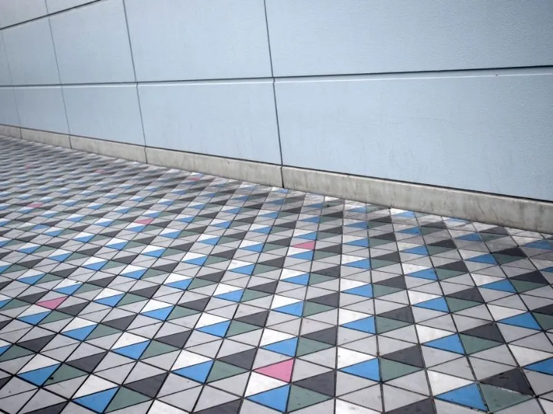white, black, red and grey triangle outdoor floor tiles and white wall outdoor tiles
